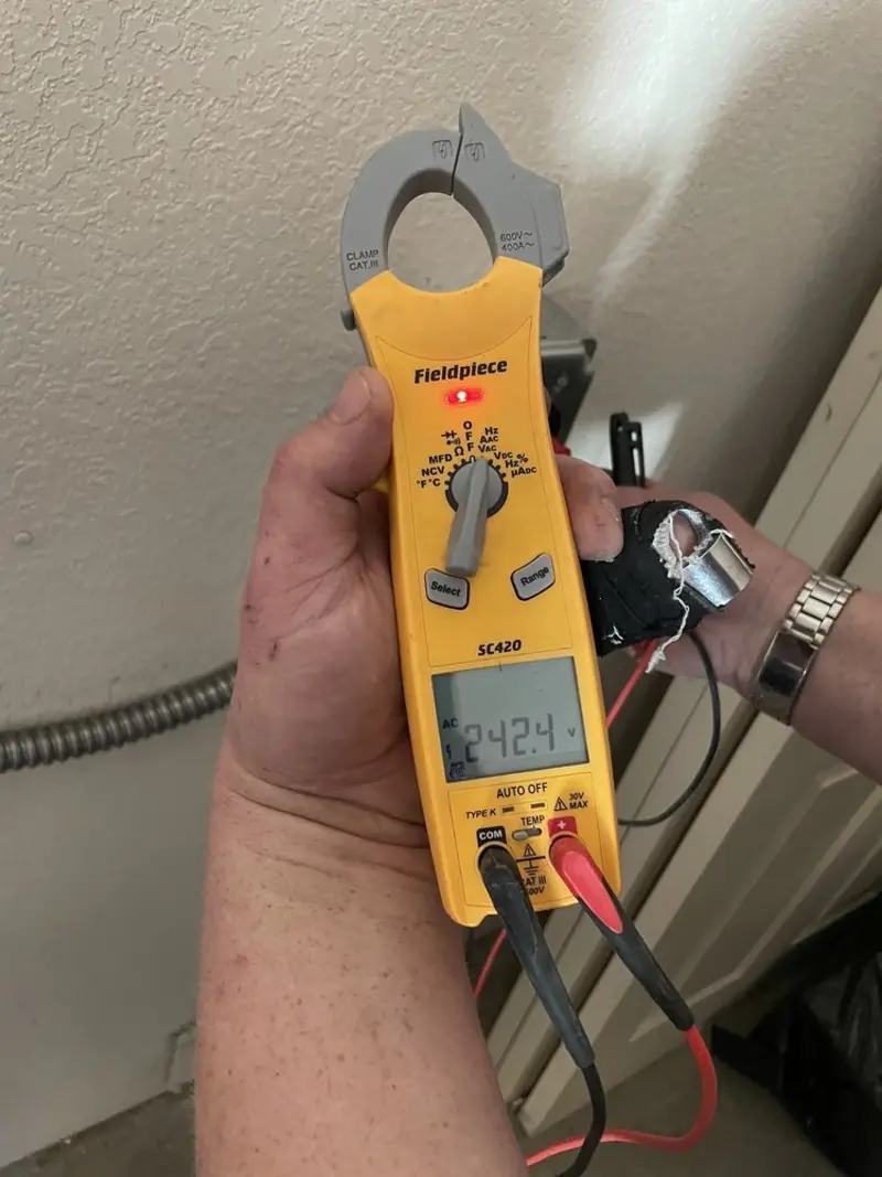 Voltage testing with clamp meter during Circuit Breaker Repair in Broken Bow